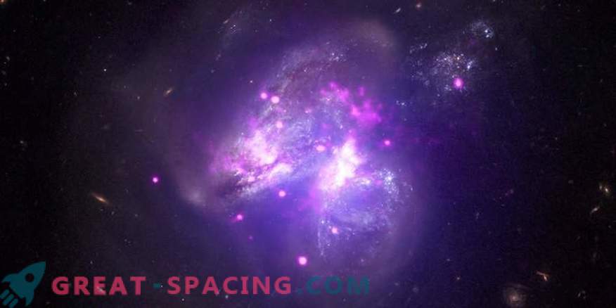 Arp 299: paste galactice