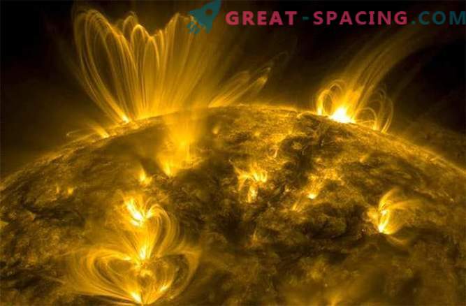 Exploziile solare puternice cauzate de liniile magnetice uriașe.