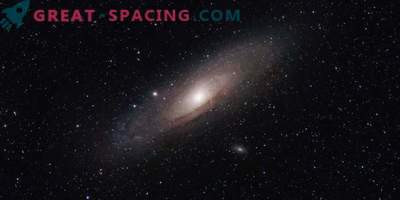 O pereche gigantică de găuri negre care apar în galaxia Andromeda